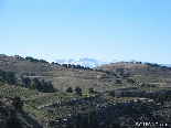 Snow On The Mountains Behind The Park In Automn